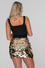 Sequin embellished gold mini skirt